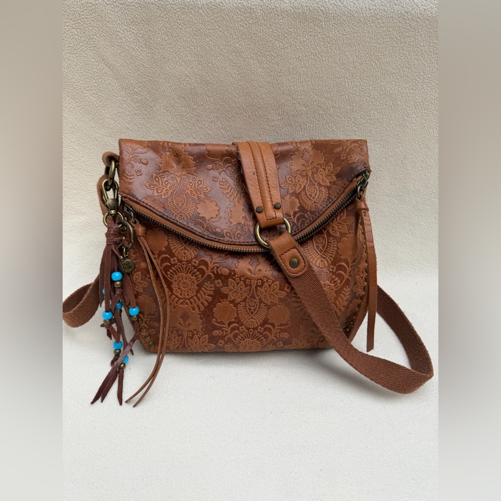 The Sak Silverlake Crossbody Bag in the Tobacco Floral Emboss color.